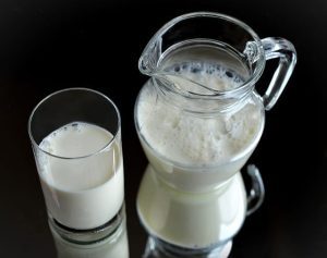pitcher and glass of milk